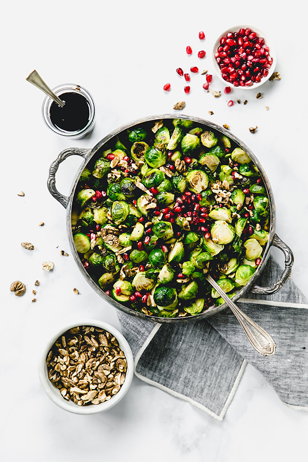 Brussels sprouts with hickory nuts, pomegranate seeds and pomegranate syrup