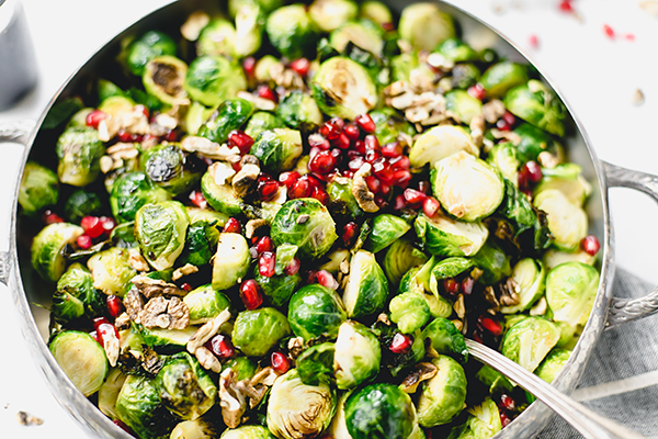 Brussels sprouts with hickory nuts, pomegranate seeds and pomegranate syrup