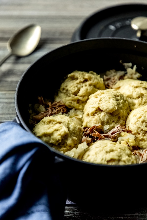 Homemade sauerkraut with pork and light, fluffy gluten-free dumplings
